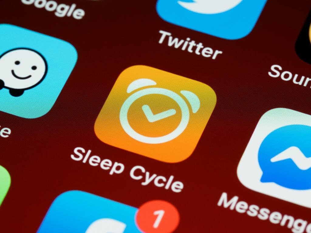 Detailed close-up of Sleep Cycle app icon on smartphone home screen with other applications.